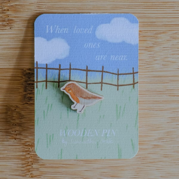 Robin, when loved ones are near. Illustrated Wooden Pin badge 