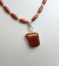 Tiger's Eye Freeform Pendant Necklace with Sterling Silver and Goldstone  - Image 1