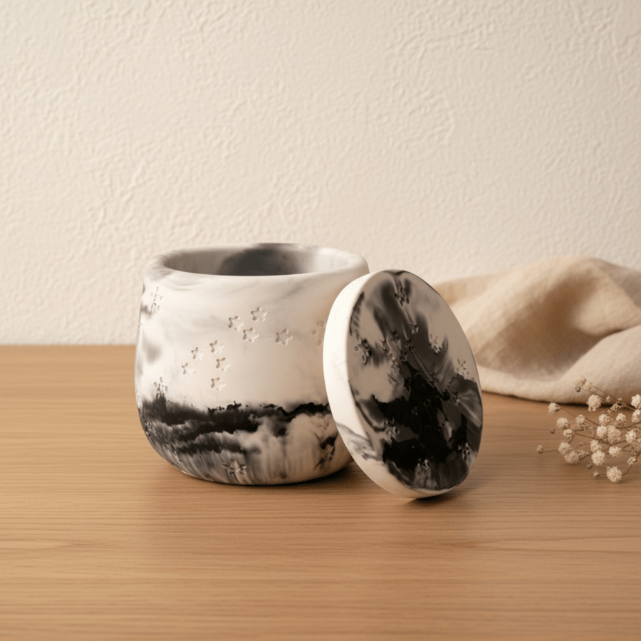 White and black marbled jewellery box with star details and flat lid