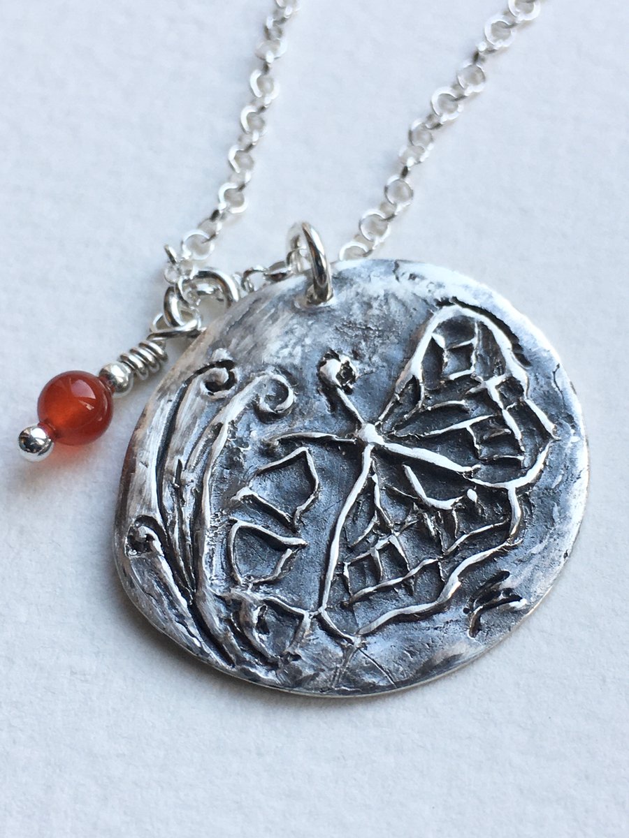 Butterfly pendant handmade in fine silver with carnelian 