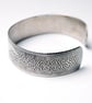 Steel wolf bracelet with celtic knot detail - Image 4