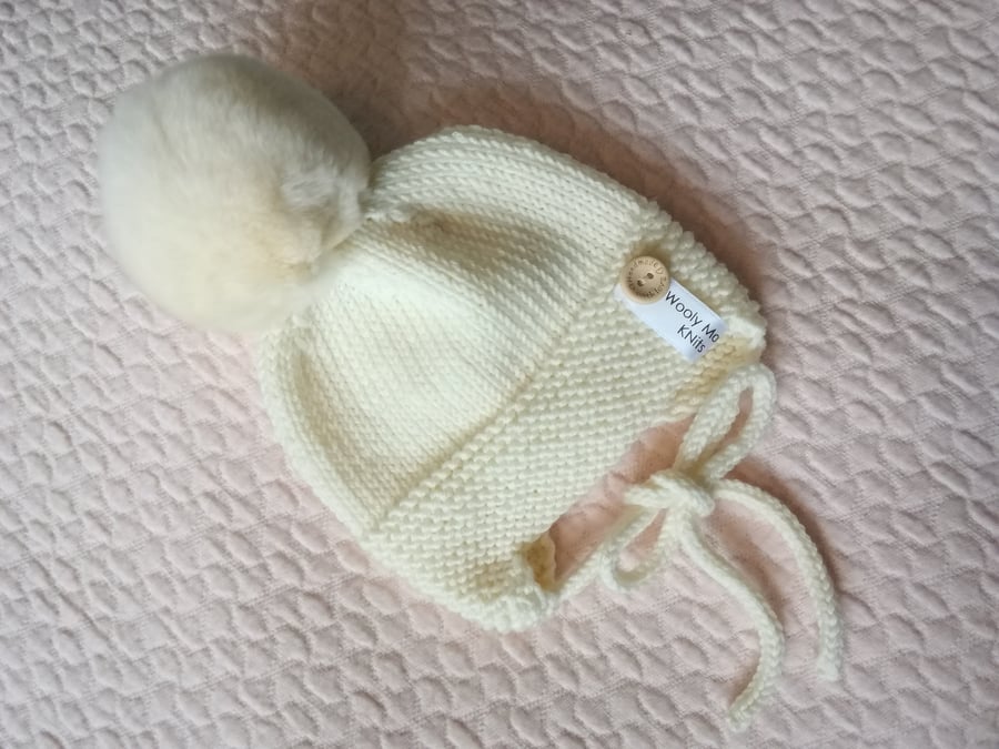 Hand knitted baby hat, bonnet, helmet 