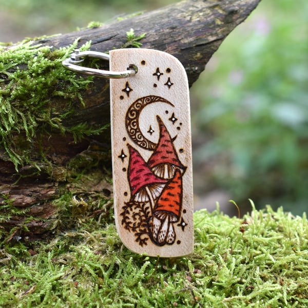 Fungi under the moon. Pyrography key ring.