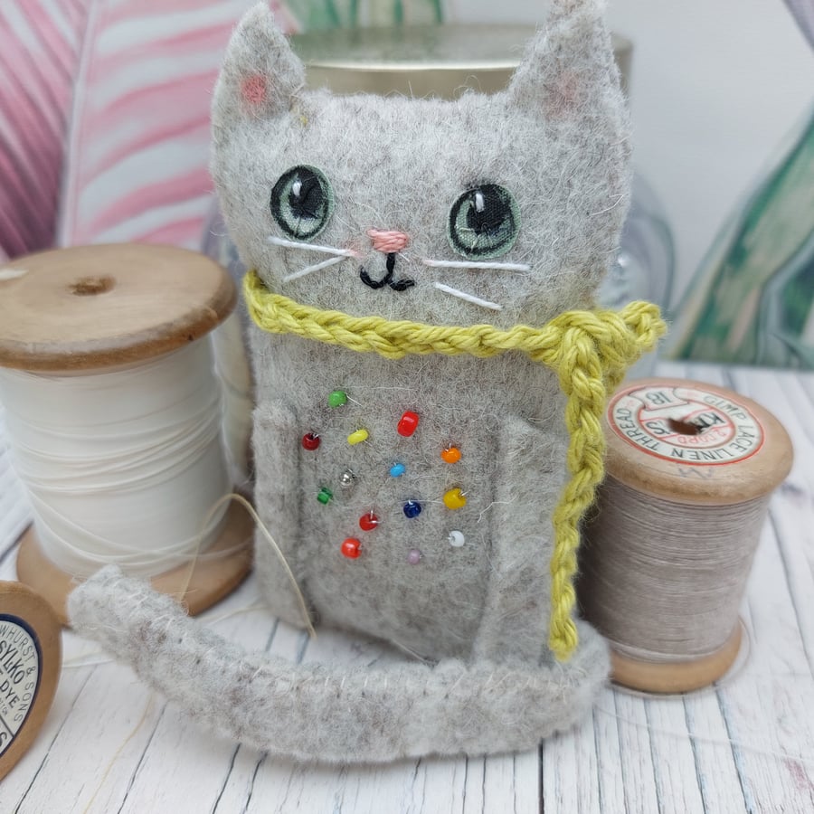 Felt cat in a scarf