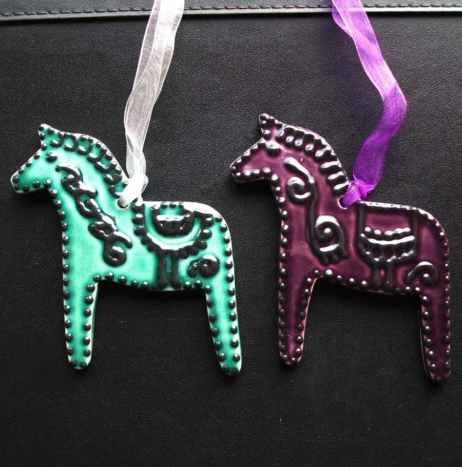 Set of  two ceramic folk horse decorations