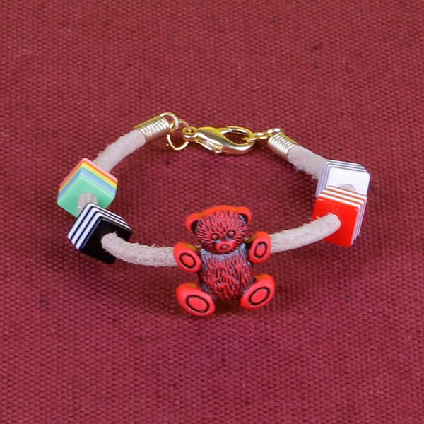 7 - CHILD'S LEATHER THONG BRACELET