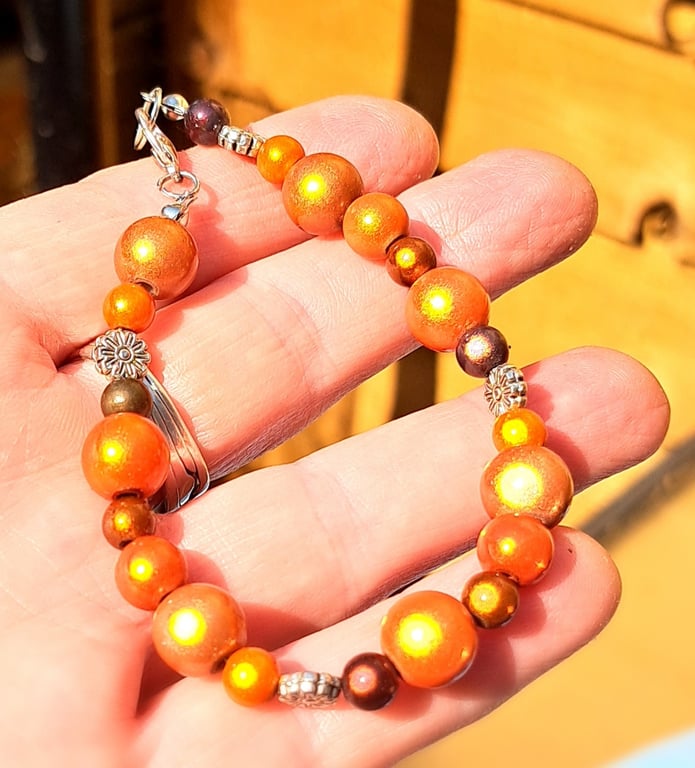 Bracelet with disco beads, brown, orange and silver spacers