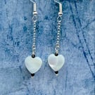 Mother of pearl heart drop earrings with tiny black faceted spinel stones
