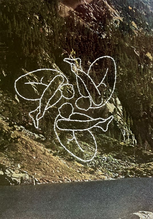 Hand embroidered vintage book page