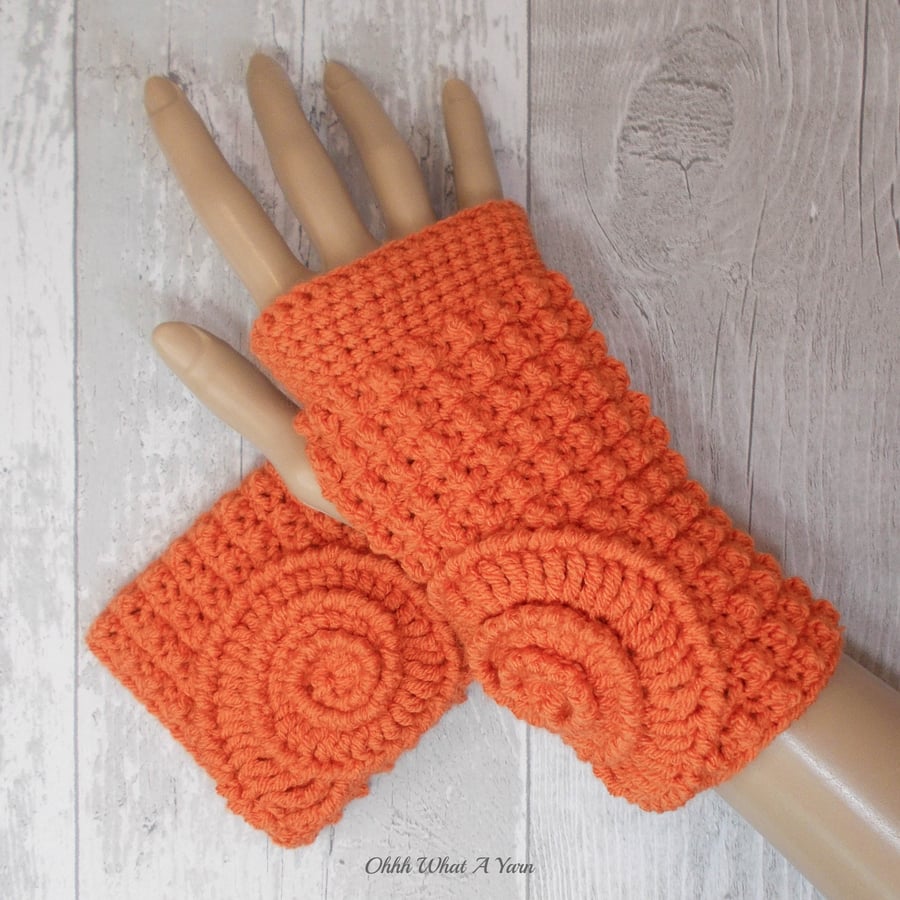 Orange, burnt orange ammonite ladies crochet gloves, finger less gloves.  
