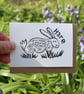 Handprinted linocut card featuring a hare - small card