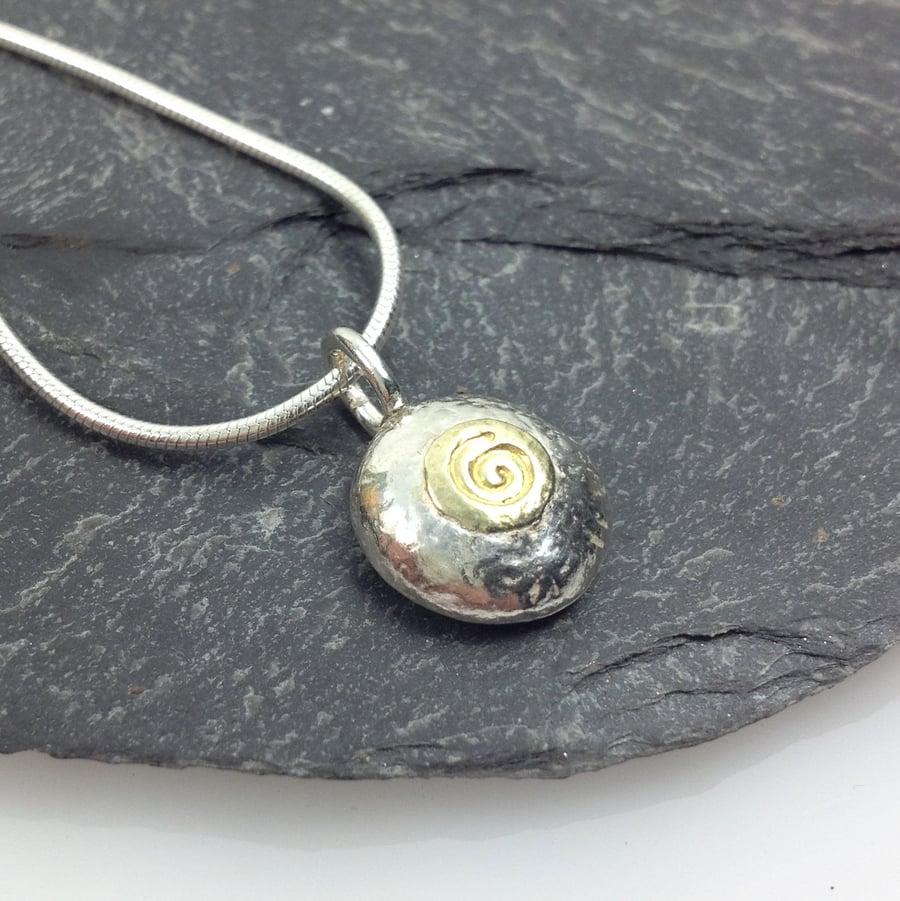 Silver and 18ct gold spiral pebble pendant and chain