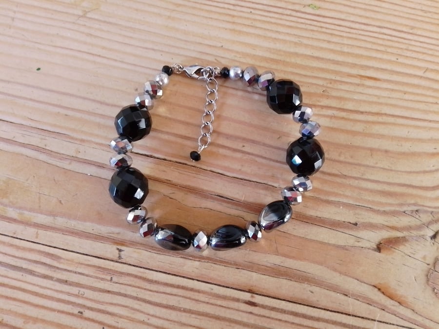 Handmade bracelet made using pre-loved beads.