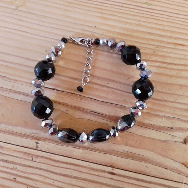 Handmade bracelet made using pre-loved beads.