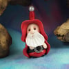 Gnome 'Nicholas' hiding in plain sight Undercover Santa by Ann Galvin