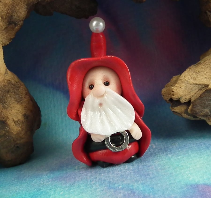 Gnome 'Nicholas' hiding in plain sight Undercover Santa by Ann Galvin