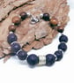 Stainless Steel Memory Wire Bracelet With Lava Beads And Sandalwood