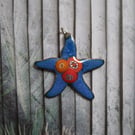 Starfish pendant in blue and red enamel on copper 269