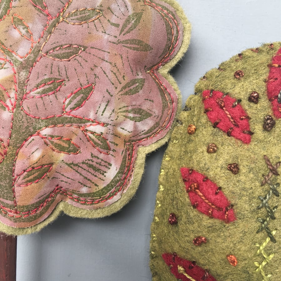 Pair of cotton reel trees