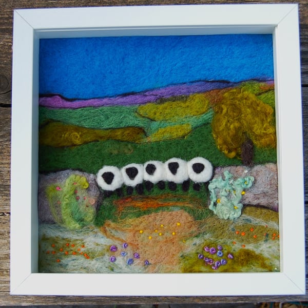 Sheep by a dry stonewall wool painting.  Needlefelt picture with hand embroidery