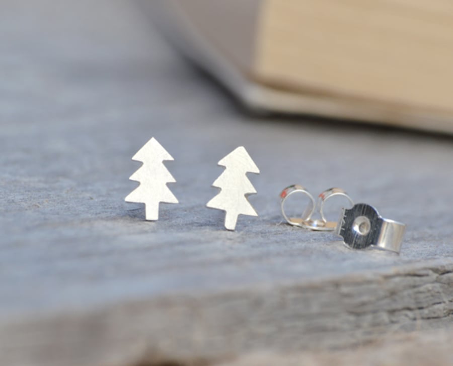Christmas tree ear studs in sterling silver, handmade by Huiyi Tan