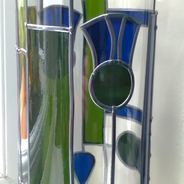 Thistle Delight is a Stained Glass Effect Flower Vase