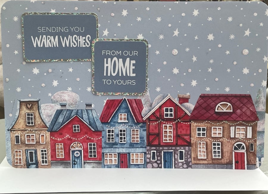 A row of Nordic houses Sending you warm wishes from our house to yours