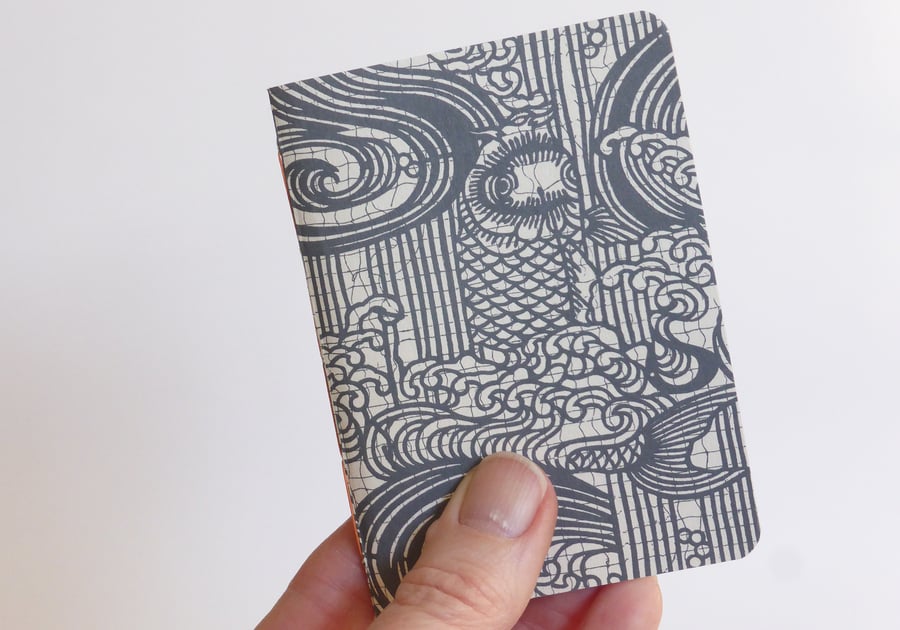 Small hand bound A7 notebook with black Japanese fish patterned cover