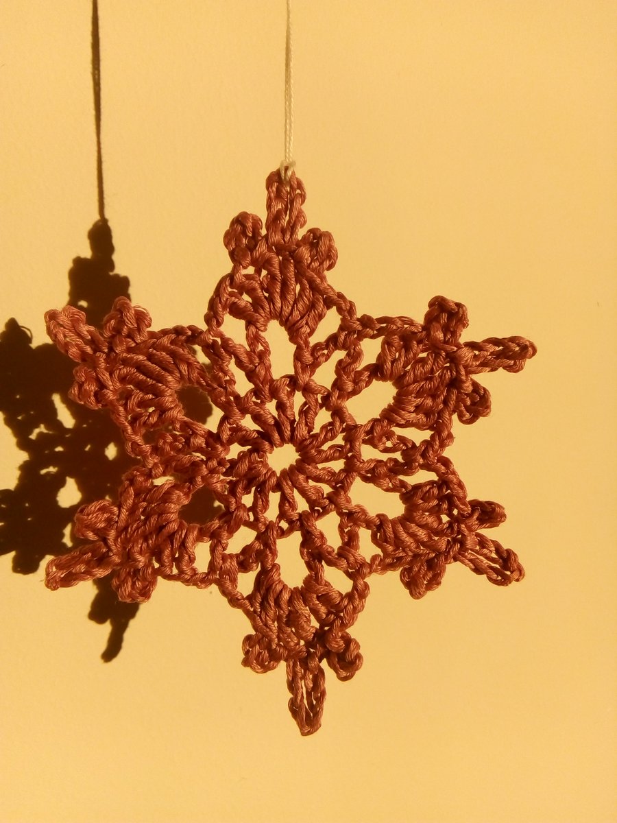 Dark pink crochet snowflakes