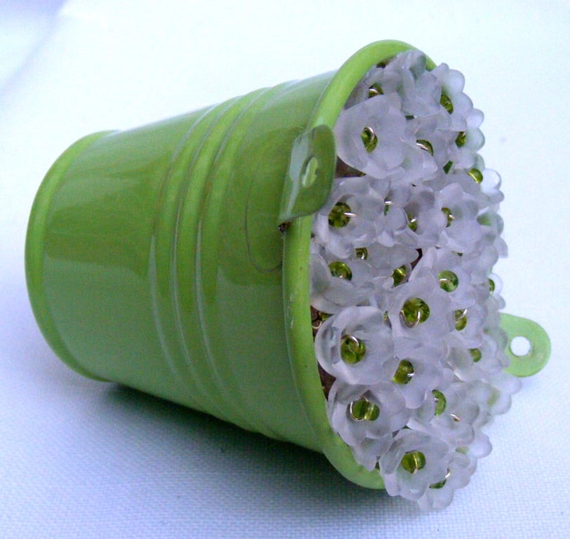 Lily of the Valley bucket of flowers decoration.