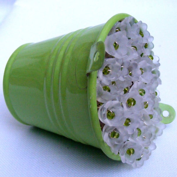 Lily of the Valley bucket of flowers decoration.