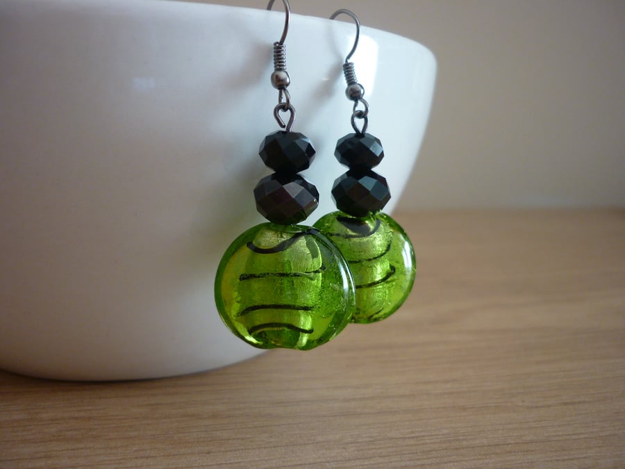 GREEN AND BLACK DANGLE EARRINGS.
