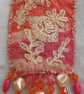 Orange and hot-pink textile art brooch 