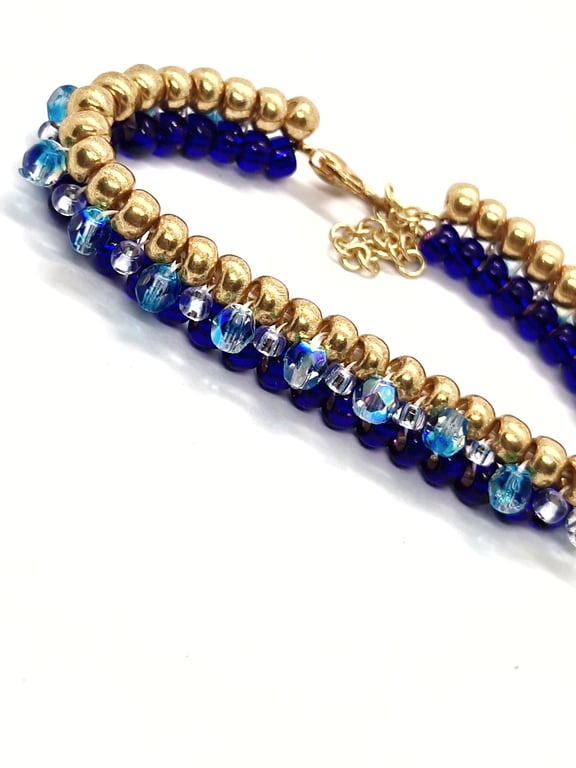 Gold, royal blue and shimmering blue tennis-style beaded bracelet