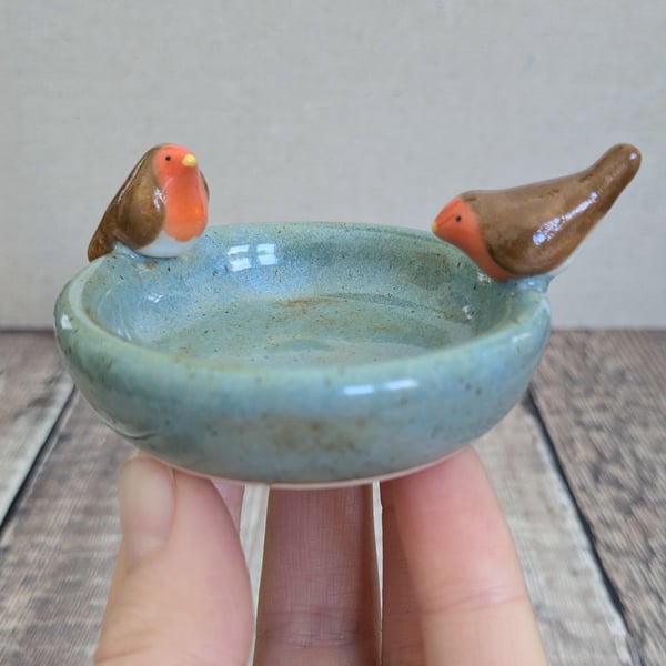 Ceramic ring dish with two mini robins