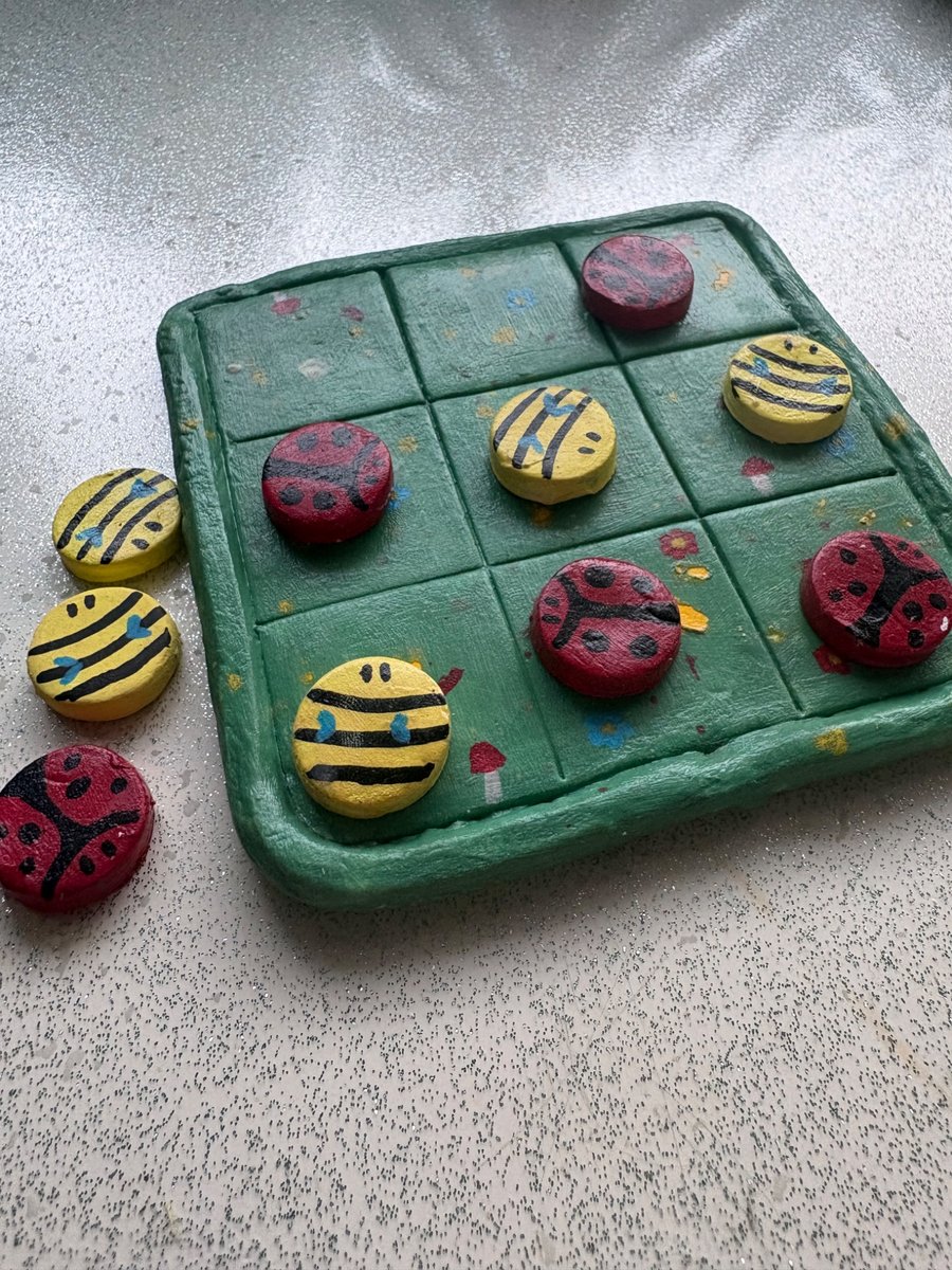 Handmade clay tik tak toe board and pieces bee and ladybug themed game