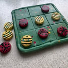 Handmade clay tik tak toe board and pieces bee and ladybug themed game