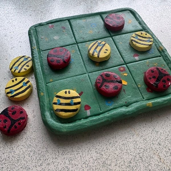 Handmade clay tik tak toe board and pieces bee and ladybug themed game