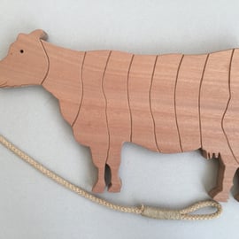 Cow Trivet in either Sapele or Tulipwood