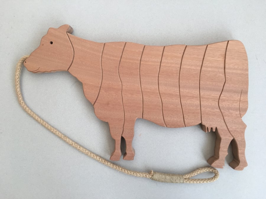Cow Trivet in either Sapele or Tulipwood