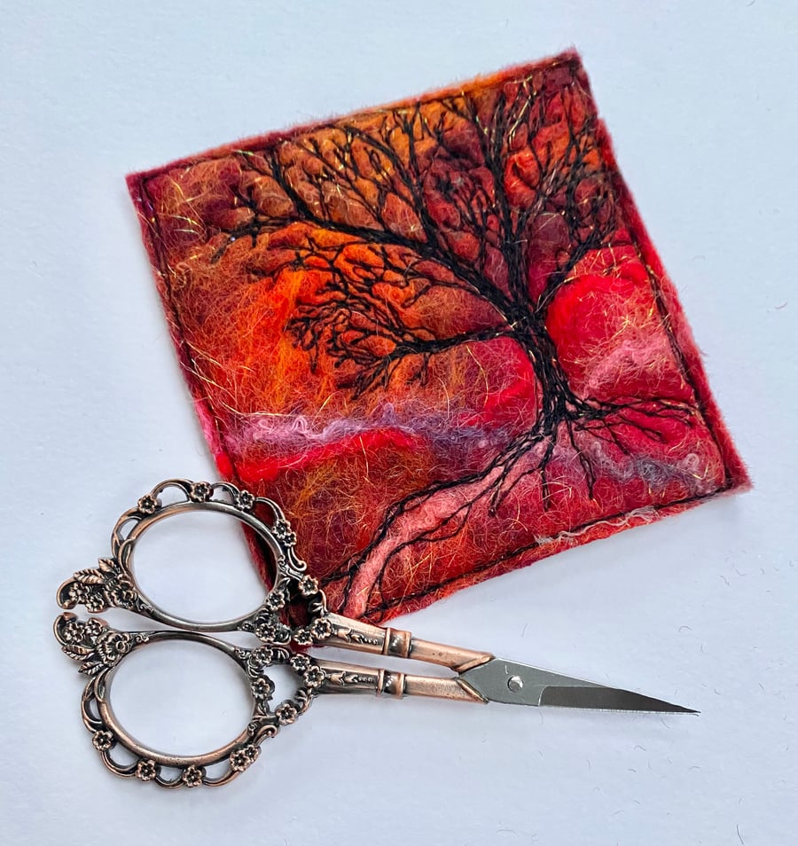 Tree silhouette with sunrise, original wet felting artwork. 