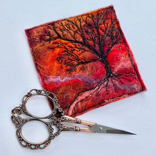 Tree silhouette with sunrise, original wet felting artwork. 