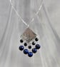 Fringed hammered silver and blue lapis pendant - Image 1