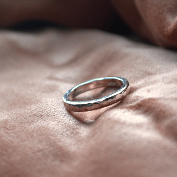 Sterling silver hammer textured D-shaped ring.