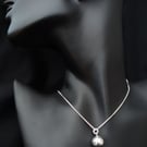 Simple sterling silver ball necklace