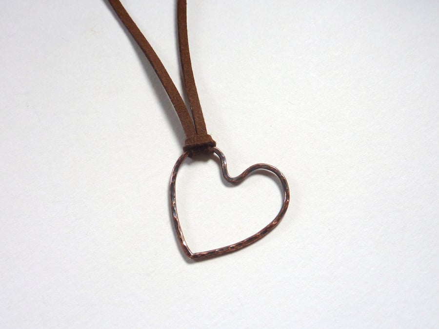Oxidised Copper Heart Pendant With Hammered Texture on Brown Microfiber Cord