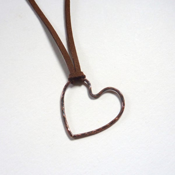 Oxidised Copper Heart Pendant With Hammered Texture on Brown Microfiber Cord