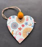 Floral starburst decoupaged wooden heart 