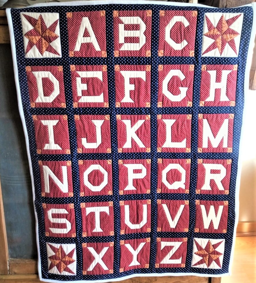 ALPHABET QUILTED THROW