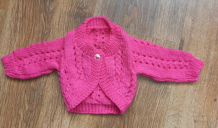 Hand knitted baby girls cardigan